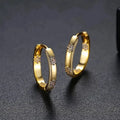 Vintage hoop earrings in the shape of a circle with a golden flower